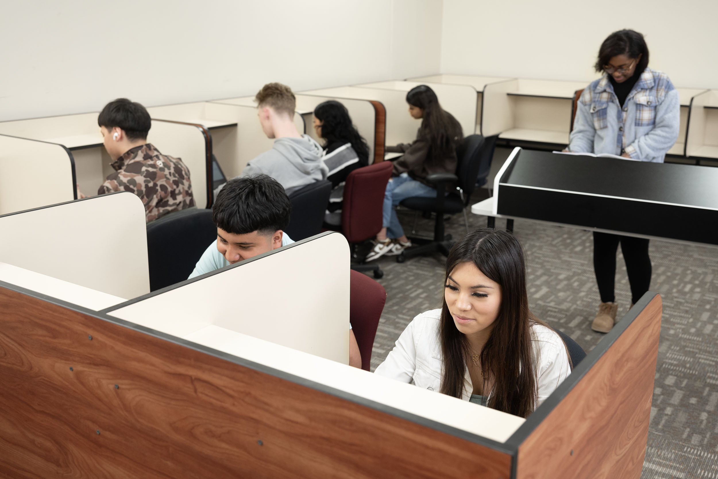 Students studying in modern university classroom setting