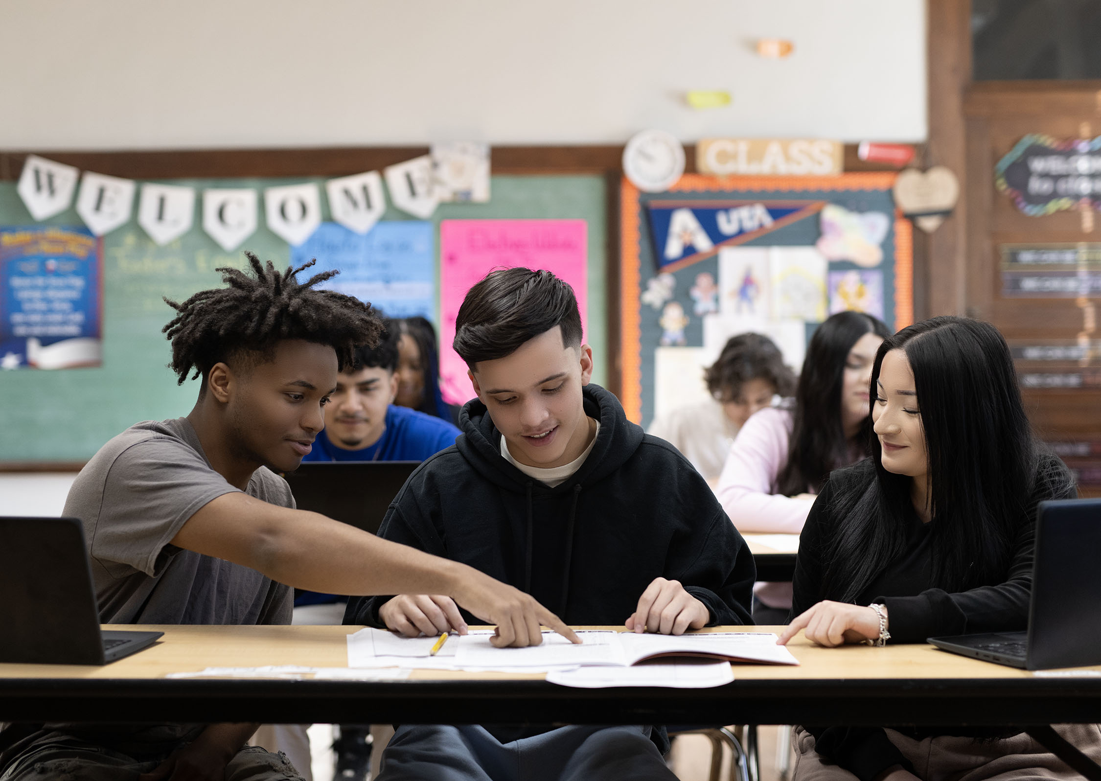 Students collaborating in a high school classroom