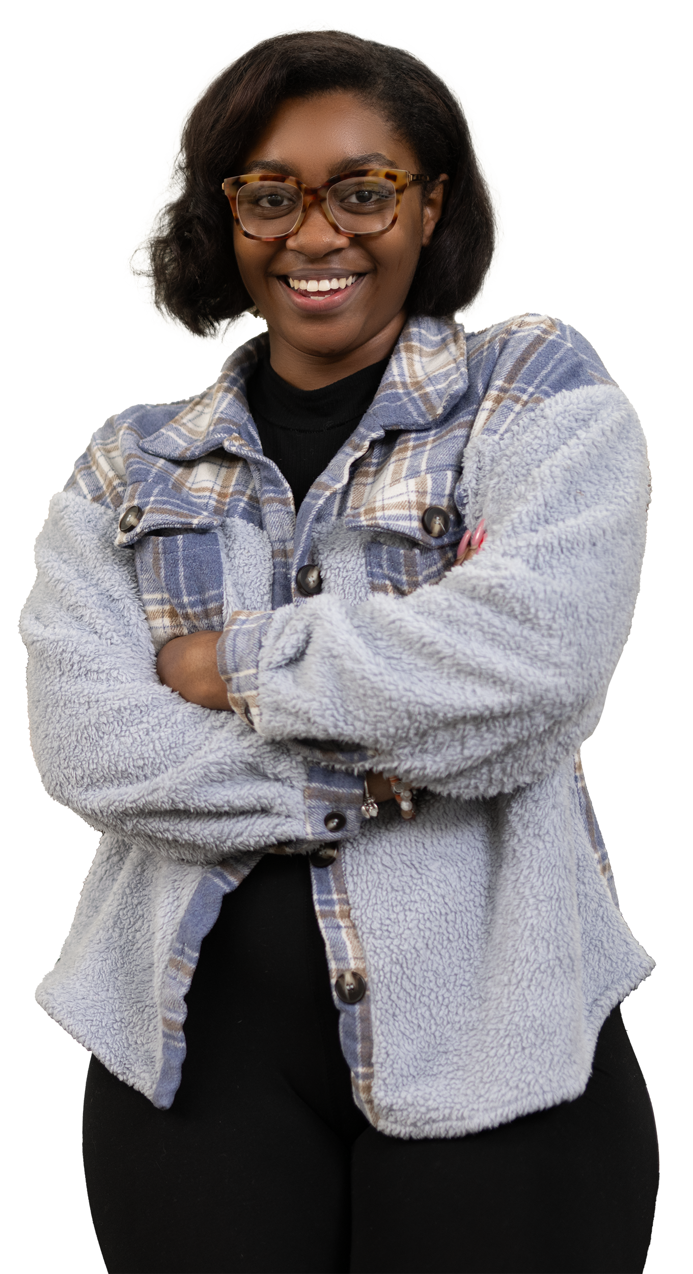 Woman smiling with crossed arms wearing glasses