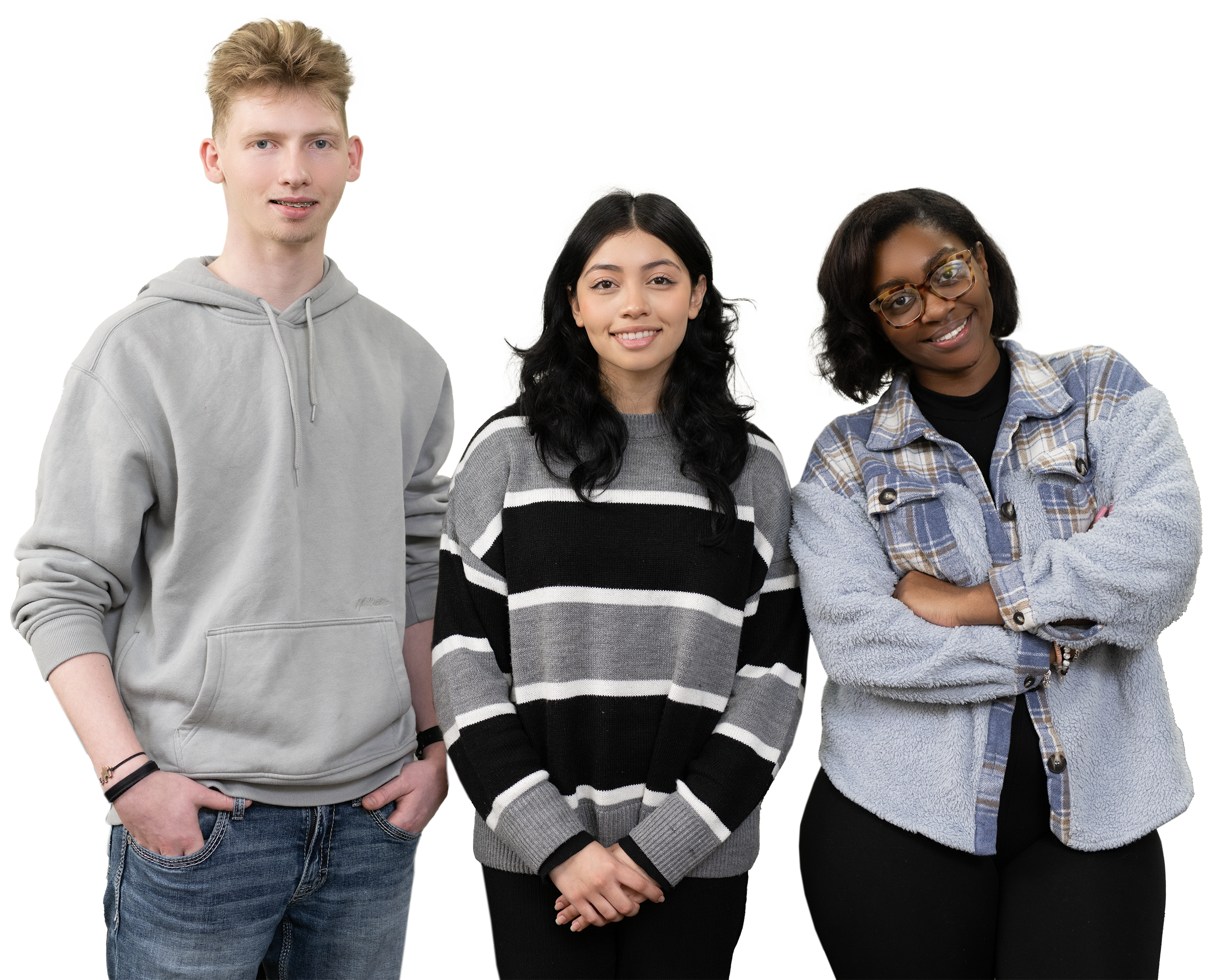 Three young adults standing together smiling