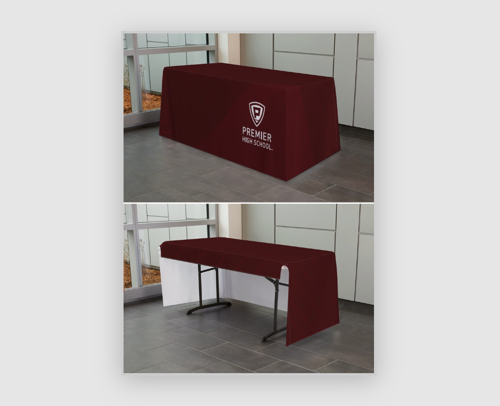 Red promotional tablecloth with Premier Healthcare logo