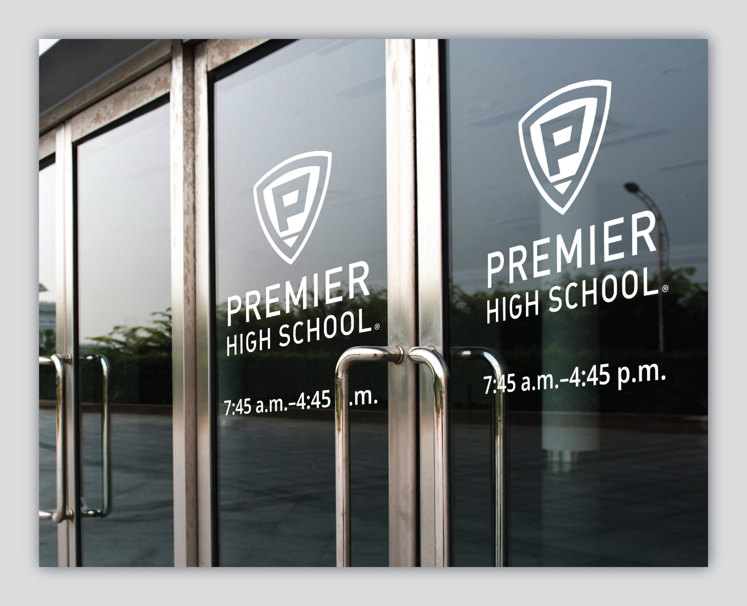 Premier High School entrance glass doors view