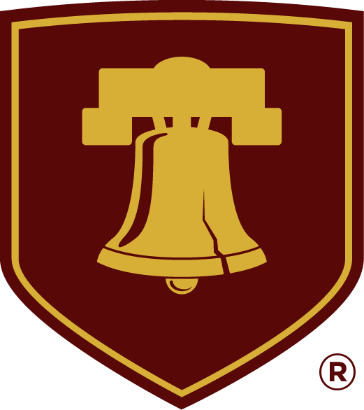 Golden bell emblem on maroon background shield.